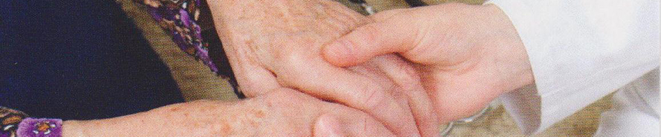 nurse holding hands of patient