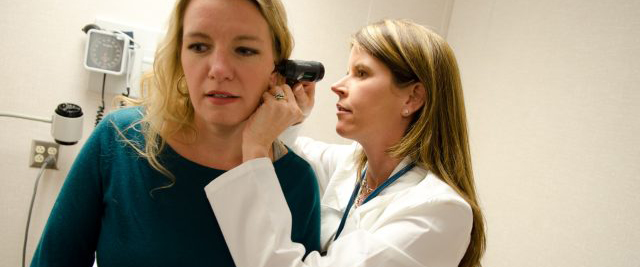 Photo of nurse and patient.