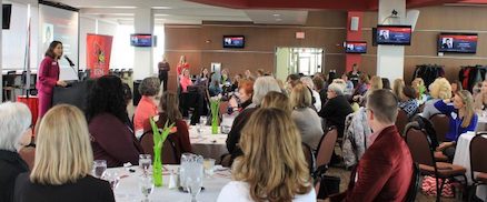 Speaker talking to staff and students in an event.